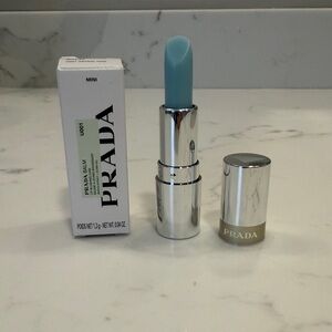 PRADA Hydrating lip balm. Color U001 Astral Pink. .04 oz trial size. NIB!